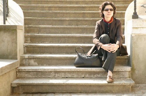 Woman Sitting on Steps