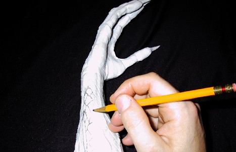 Mark Drawing on Brain Gremlin Arm