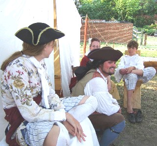 Sarah and Jack sitting by the tent