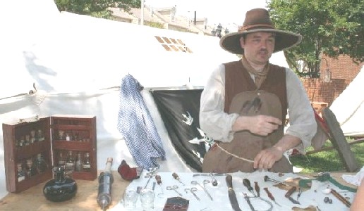 Mission at his surgeon's table