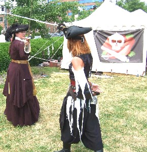 Mary Diamond and Scarlett Jai practice sword fighting