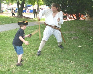 Michael Bagley and lad sword fight 1