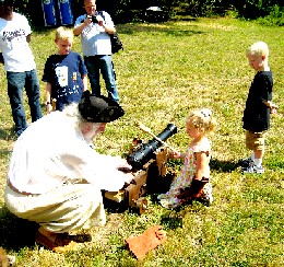 Mark training kids to fire the cannon