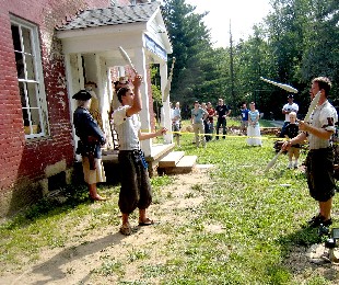 Budabi brothers juggle while the crowd waits
