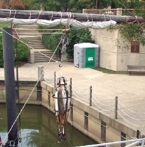 Bucky in gibbet hanging over the water