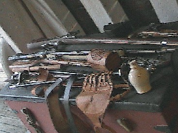 A pile of weapons on a chest