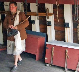 Tom in raggedy pirate slops