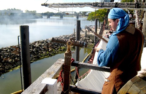 Mission firing the deck gun