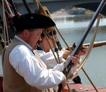 Dan Needham checks his black powder gun