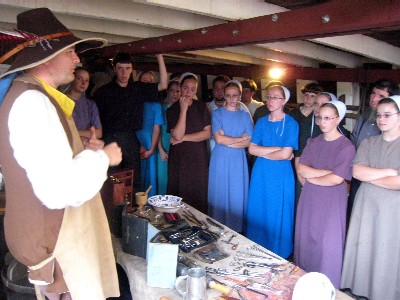 Mission explaining period surgery to a group