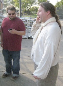 Michael talking with scavenger hunt organizer