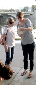 Scavenger hunters reading the message from the bottle