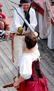 Thomas sword fights with Rachel