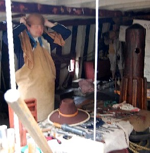 Mission putting on his head scarf at the surgical table