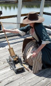 Kate rams the mortar load home