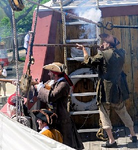 The defenders firing at the pirates