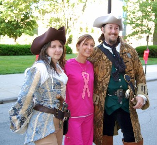 Trish and Shannon pose with a Koman racer