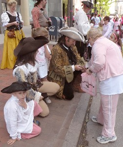 Shannon, Trish and the Thatcher kids talking with Koman race attendees