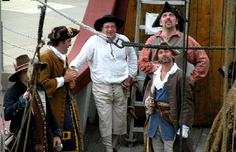 The pirates watch people in the rigging