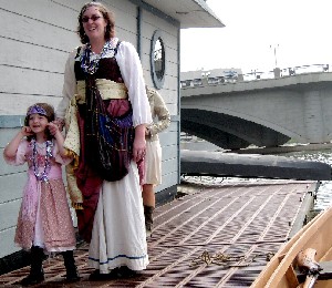 Woman and little girl waiting at the dock