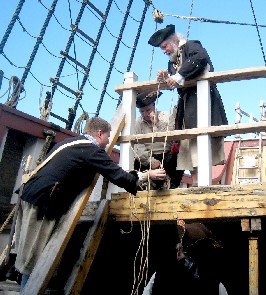 Thos. assists Mark and Bryan with the cannon lifting