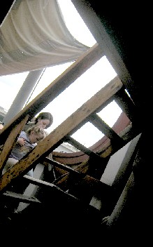 Woman and kid climbing up to the quarterdeck