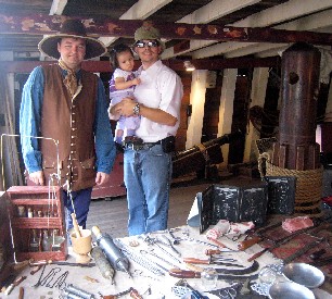 Mission and a guy in a funny hat with a kid