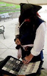 Captain J Examines John's Coins