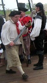 Jay Holding a Sword Upside-Downey