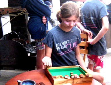 A Girl with Pink Bandages 
        Plays Period Games