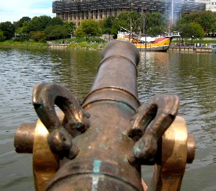 The deck gun aimed at a distant Santa Mari
