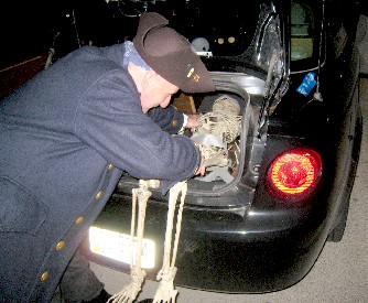 Bryan putting the skeleton in the back