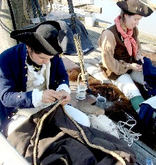 Andrea sewing with Nathan