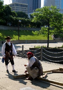 Dennis watches M.A. d'Dogge assembly the gibbet