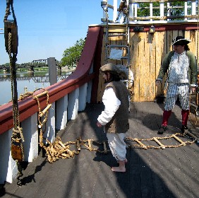 Michael and Grace placing the ladder over the side 1