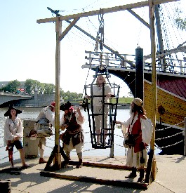 Linda being raised in the gibbet
