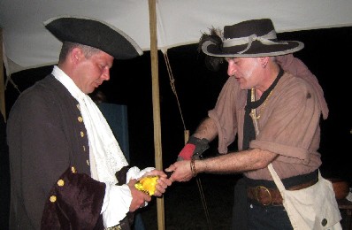 Edward and Stynky pull a mead cork