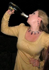 Rebecca guzzling champaign