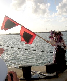 Liberte Sparrow holding the flags