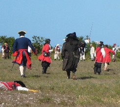 The British rush onto the field