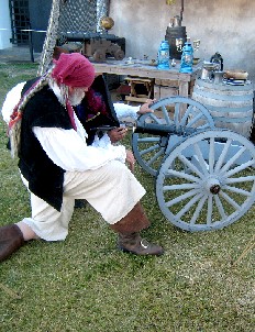Crudbeard and the Viceroy looking in a cannon