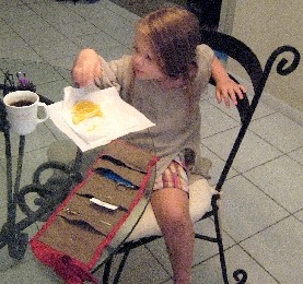 Kiera Eating Her Orange