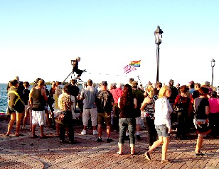 Crowd Gathers To Watch High Wire Act