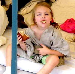 Keira with a Mouthful of Food