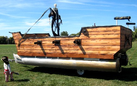 Kid looking at pirate pontoon at entry
