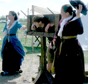 Mary and Jamie man the stocks