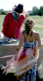 The surgeon holding on to his hat