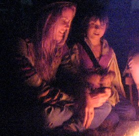 Girl and Zach at the campfire