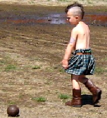 Boy with kilt and mohawk