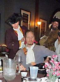 Mary braiding Thomas' hair